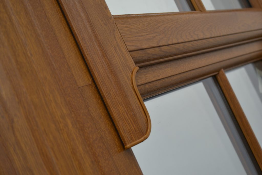 A close up of the wood grain on the window